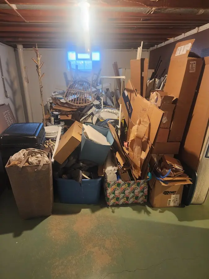 Roll-off dumpster container at job site for 2 Yard Dumpster Rental in Smithville